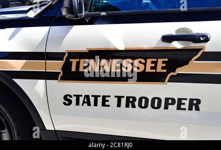 Close up of the driver door of a Tennessee State Trooper patrol car, with the graphic design outline  of the state of TN Stock Photo