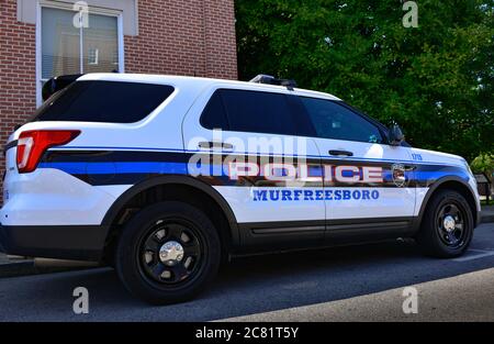 A parked Murfreesboro Tennessee Police SUV patrol car, with the graphic design signage on vehicle in blue, black and red in Murfreesboro, TN Stock Photo