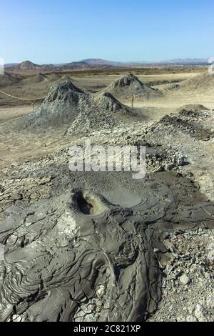 Mud volcanoes of Gobustan, Azerbaijan. Active volcanoes. Valley of craters and volcanoes. Bubbling crater of a mud volcano. Stock Photo