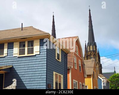 Historic Sydney Street houses and the spires of St Dunstan’s Basilica Cathedral, Charlottetown, Prince Edward Island, Canada Stock Photo