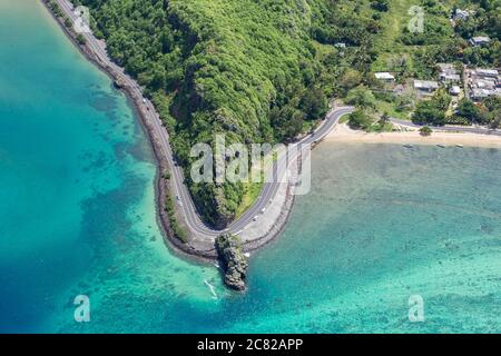 Coastal road facing the turquoise lagoon, aerial view by drone, Bel Ombre, Baie Du Cap, South Mauritius, Indian Ocean, Africa Stock Photo