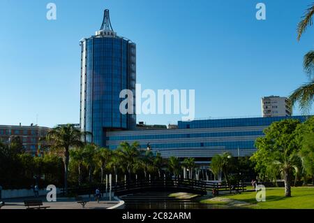 CAGLIARI, SARDINIA, ITALY - JULY 20 2020: Modern architecture design glass tower, T Hotel, view from the Parco della Musica Stock Photo