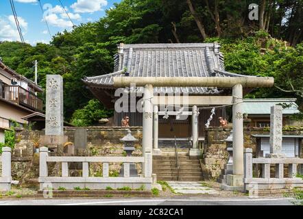 chiba, japan - july 18 2020: Torii gate of the shintoist Kanaya Shrine dedicated to the god of metal Kanayama Hikonokami at the foot of the stone quar Stock Photo