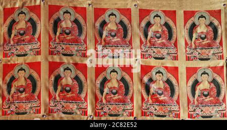 Tibetan thangka-Buddha Sakyamuni pinned to the wall. Thirty-three Heaven Grottoes-MatiSi-Zhangye-China-0982 Stock Photo