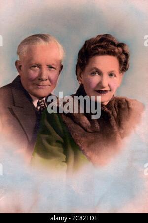 Hand colored photograph of Eastern European immigrant couple, circa 1940s,New York, USA. Stock Photo
