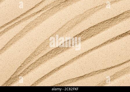 Diagonal lines and texture on sand. Stock Photo