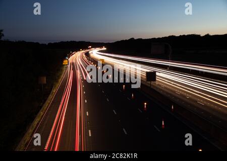 Night shot of traffic on the M25 Motorway with light trails Stock Photo
