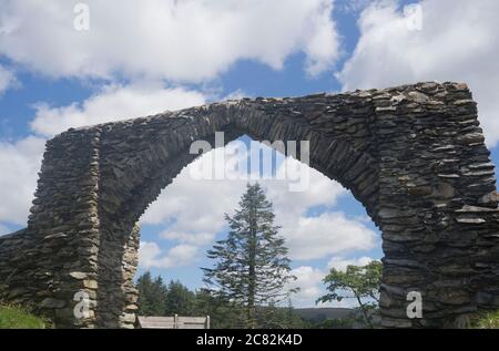 Y Bwa / Hafod Arch at Ystwyth Forest nature trail with many trees felled due to infection with Larch disease in Ceredigion,Wales,UK Stock Photo
