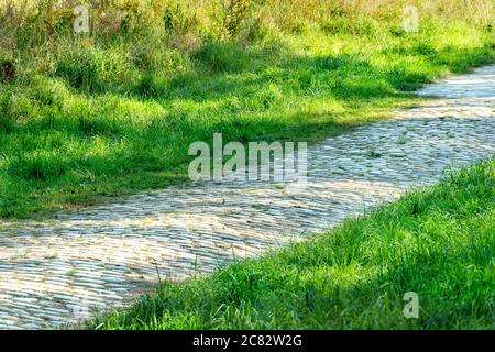 Cobbled pebble footpath Stock Photo - Alamy