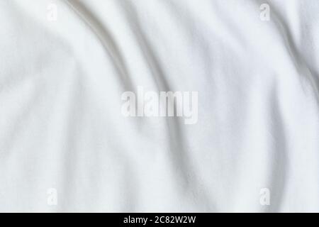 Silk fabric of white color as background and texture. Stock Photo