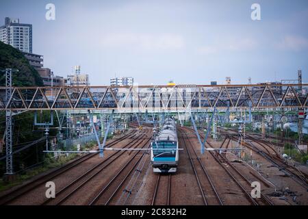 A poster of Trevor Bauer who's pitching for the Yokohama BayStars is placed  at the platform of a train station on Tuesday, May 2, 2023, in Yokohama  near Tokyo. Bauer will pitch