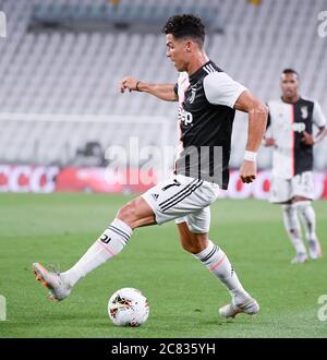Turin, Italy. 20th July, 2020. FC Juventus' Cristiano Ronaldo dribbles the ball during the Serie A football match between FC Juventus and Lazio in Turin, Italy, July 20, 2020. Credit: Federico Tardito/Xinhua/Alamy Live News Stock Photo