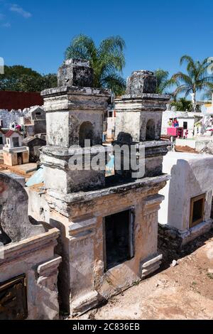 Colorful gravestones in a cemetery at Cacalchen, Yucatan, Mexico. Stock Photo