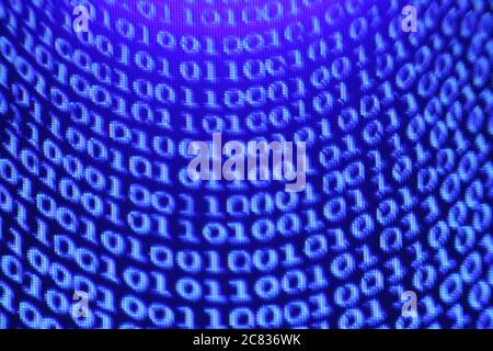 Blurred digital background, numbers on a screen Stock Photo
