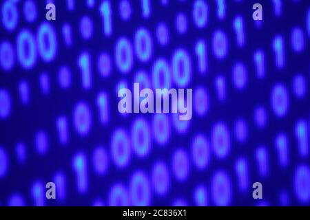 Blurred digital background, numbers on a screen Stock Photo