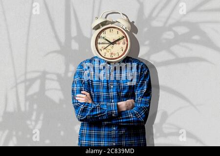 watches clock instead of human head, work time concept, creative idea Stock Photo