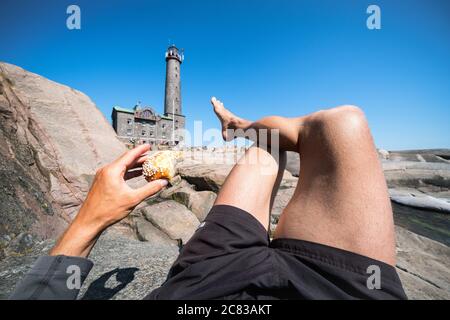 Relaxing at Bengtskär lighthouse, Kemiönsaari, Finland Stock Photo