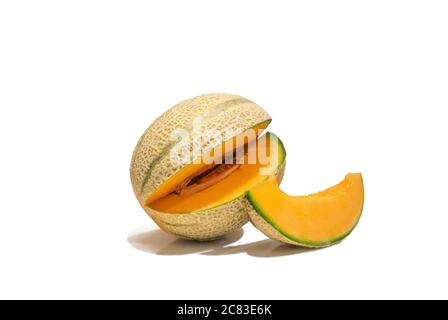 Fresh ripe wedge cut cantaloupe melon and one melon slice isolated on white background Stock Photo