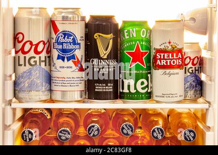 Calgary, AB, Canada. July 20, 2020. Various Tallboys Can craft Domestic and imported beers from around the world on a mini fridge Stock Photo