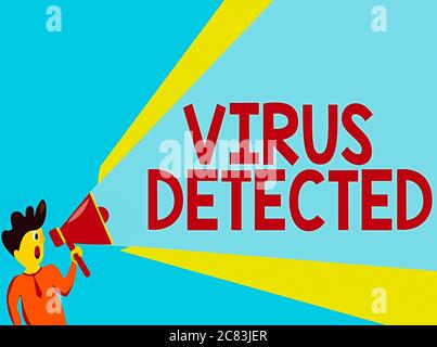 Word writing text Virus Detected. Business photo showcasing a computer program used to prevent and remove malware Man Standing Talking Holding Megapho Stock Photo