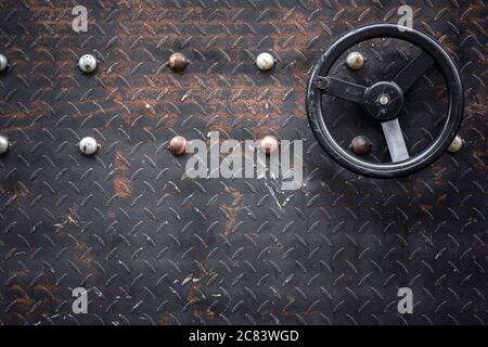 A rusty metal steel screwed panel texture background. Stock Photo