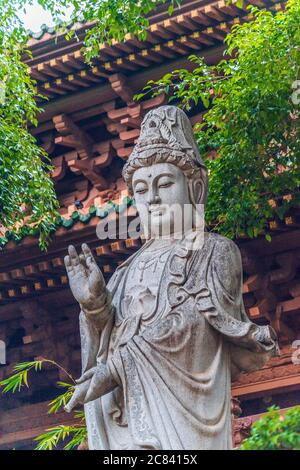 Pleiku, Vietnam - 11 July 2020: Buddha statues, architectural details of Minh Thanh pagoda, a majestic Buddhist architectural structure in Pleiku city Stock Photo