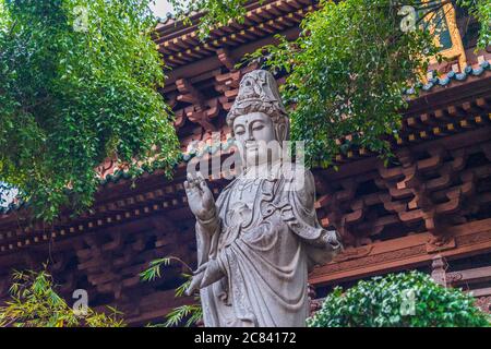 Pleiku, Vietnam - 11 July 2020: Buddha statues, architectural details of Minh Thanh pagoda, a majestic Buddhist architectural structure in Pleiku city Stock Photo