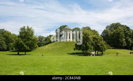 Munich, Bavaria / Germany - July 13, 2020: Panorama of with the Monopteros. A greek stlye round temple located inside the Englischer Garten. Stock Photo
