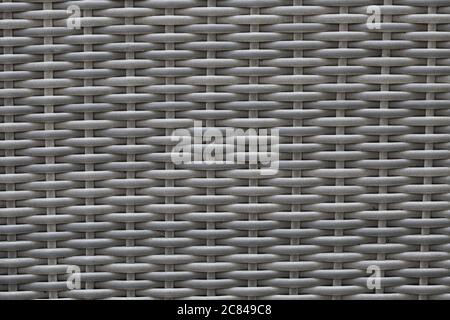 A full frame background of grey rattan with copy space Stock Photo