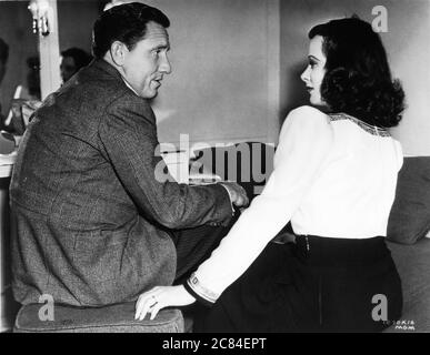 SPENCER TRACY visits co-star HEDY LAMARR in her portable dressing room on set candid during the filming of I TAKE THIS WOMAN 1940 directors W.S. VAN DYKE FRANK BORZAGE and JOSEF von STERNBERG Metro Goldwyn Mayer Stock Photo