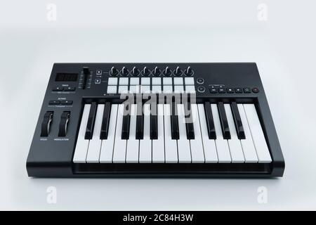 midi controller keyboard, pads nobs and keys. Stock Photo