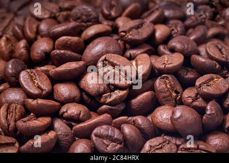 beautiful coffee beans scattered on the surface Stock Photo