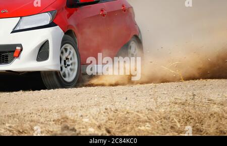 Rally racing car on dirt road. Stock Photo