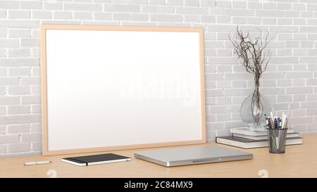 Horizontal poster frame mockup on the wooden table of home studio workspace with white brick wall. Side view, clipping path around poster picture. 3d Stock Photo