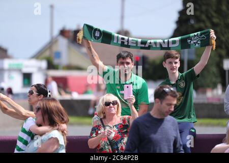 Irish football fans gather at Walkinstown Roundabout, Dublin to celebrate the life of former Republic of Ireland manager Jack Charlton at the same time of funeral in Newcastle. The World Cup winner, died on July 10 aged 85. Stock Photo