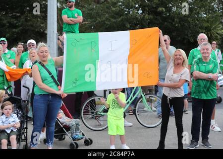 Irish football fans gather at Walkinstown Roundabout, Dublin to celebrate the life of former Republic of Ireland manager Jack Charlton at the same time of funeral in Newcastle. The World Cup winner, died on July 10 aged 85. Stock Photo