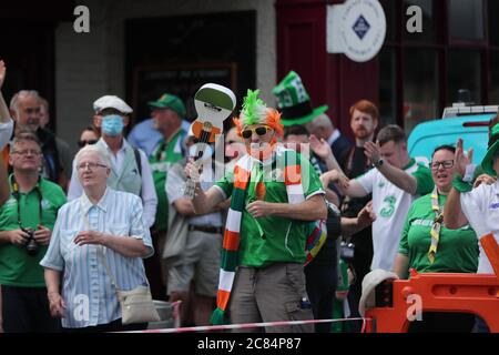 Irish football fans gather at Walkinstown Roundabout, Dublin to celebrate the life of former Republic of Ireland manager Jack Charlton at the same time of funeral in Newcastle. The World Cup winner, died on July 10 aged 85. Stock Photo