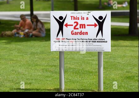 London, England, UK. COVID-19 precautions in the Jubilee Gardens on the South Bank. Signs advising social distancing Stock Photo