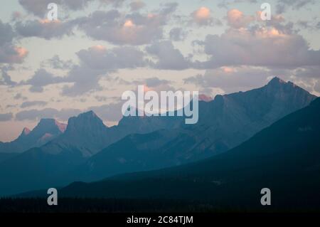 Three Sisters and Mount Lawrence Grassi, Canmore, Alberta, Canada. Stock Photo