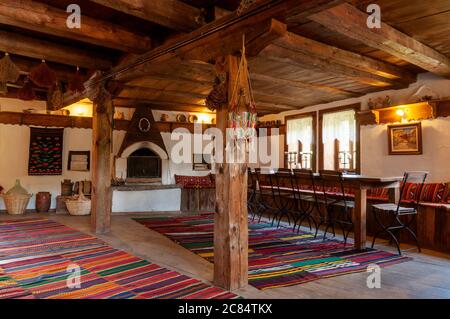 Old unique 18th century interior of traditional Bulgarian timber house and heritage building as example of typical architecture style in the Rhodope Mountains on the Balkan Peninsula in Southeastern Europe Stock Photo