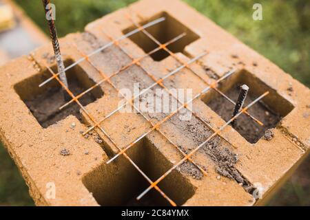 Top view of building blocks with through empty cells - through reinforcement for strength and reliability Stock Photo