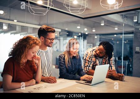 Entrepreneurs desginers architects business people conference in office Stock Photo