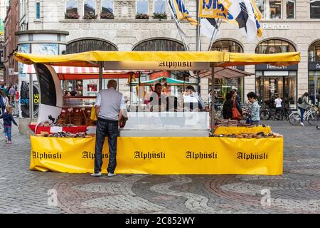 Food market stall in Basel city centre Stock Photo