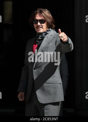 London, UK. 21st July, 2020. American actor Johnny Depp arrives at the High Court in London where he is suing the Sun newspaper over an article that claimed he was a 'wife beater' on Tuesday, July 21, 2020. The trial is expected to last for two weeks. Photo by Hugo Philpott/UPI Credit: UPI/Alamy Live News Stock Photo