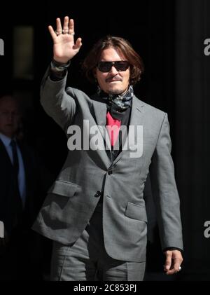 London, UK. 21st July, 2020. American actor Johnny Depp arrives at the High Court in London where he is suing the Sun newspaper over an article that claimed he was a 'wife beater' on Tuesday, July 21, 2020. The trial is expected to last for two weeks. Photo by Hugo Philpott/UPI Credit: UPI/Alamy Live News Stock Photo