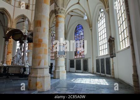 THE HAGUE, NETHERLANDS - JUNE 20, 2020: The interior of Grote of Sint Jacobskerk, with columns and stained glasses Stock Photo