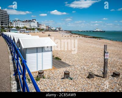 Eastbourne seafront, East Sussex, England. A bright summer view of the popular English seaside town with its landmark pier visible Stock Photo