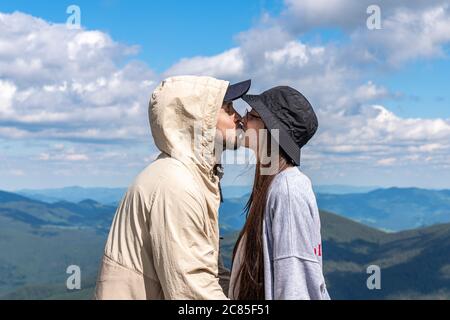 Wanderlust and travel together concept. Stylish couple travelers in hat Stock Photo