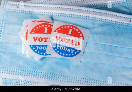 I Voted Today sticker on protective face mask for in person voting in the election in the USA during coronavirus pandemic Stock Photo