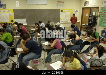 Brownsville, Texas USA, December 2, 2005: Students at Lopez High School taking a surprise quiz in geometry class.  ©Bob Daemmrich Stock Photo